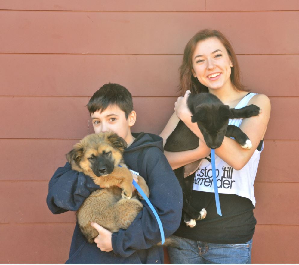Siblings Samantha & Michael with their new puppies!  Baby & Bear were fortunate enough to find a family who decided to adopt both of them together!